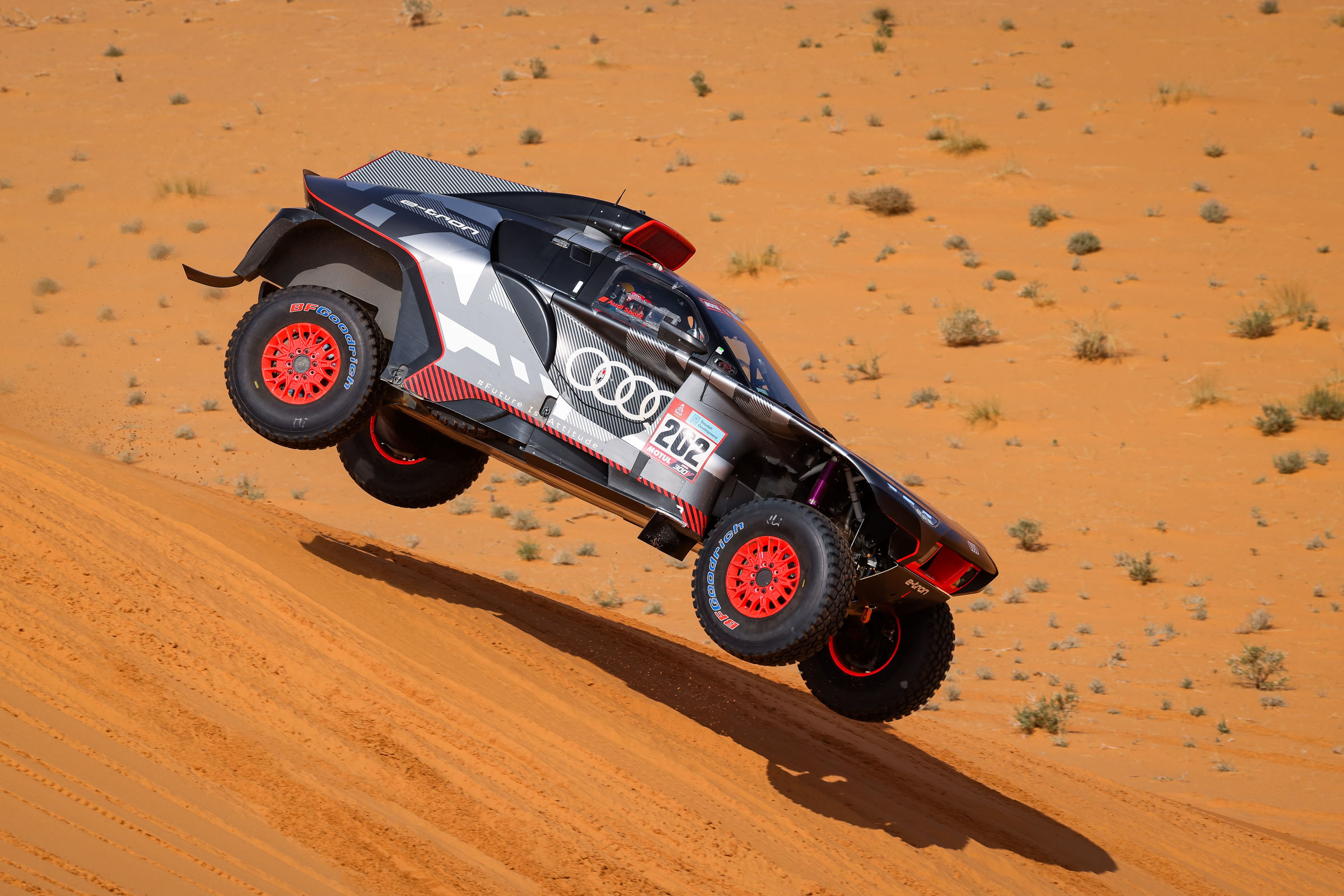 Carlos Sainz in the 2022 Dakar Rally, driving an Audi RS Q e-tron