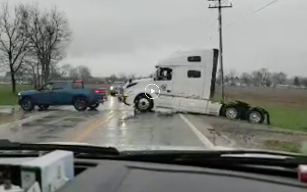 Video: Rivian EV pickup pulls semi truck out of a ditch