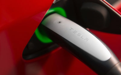 Tesla pushes to make its charger standard for EVs
