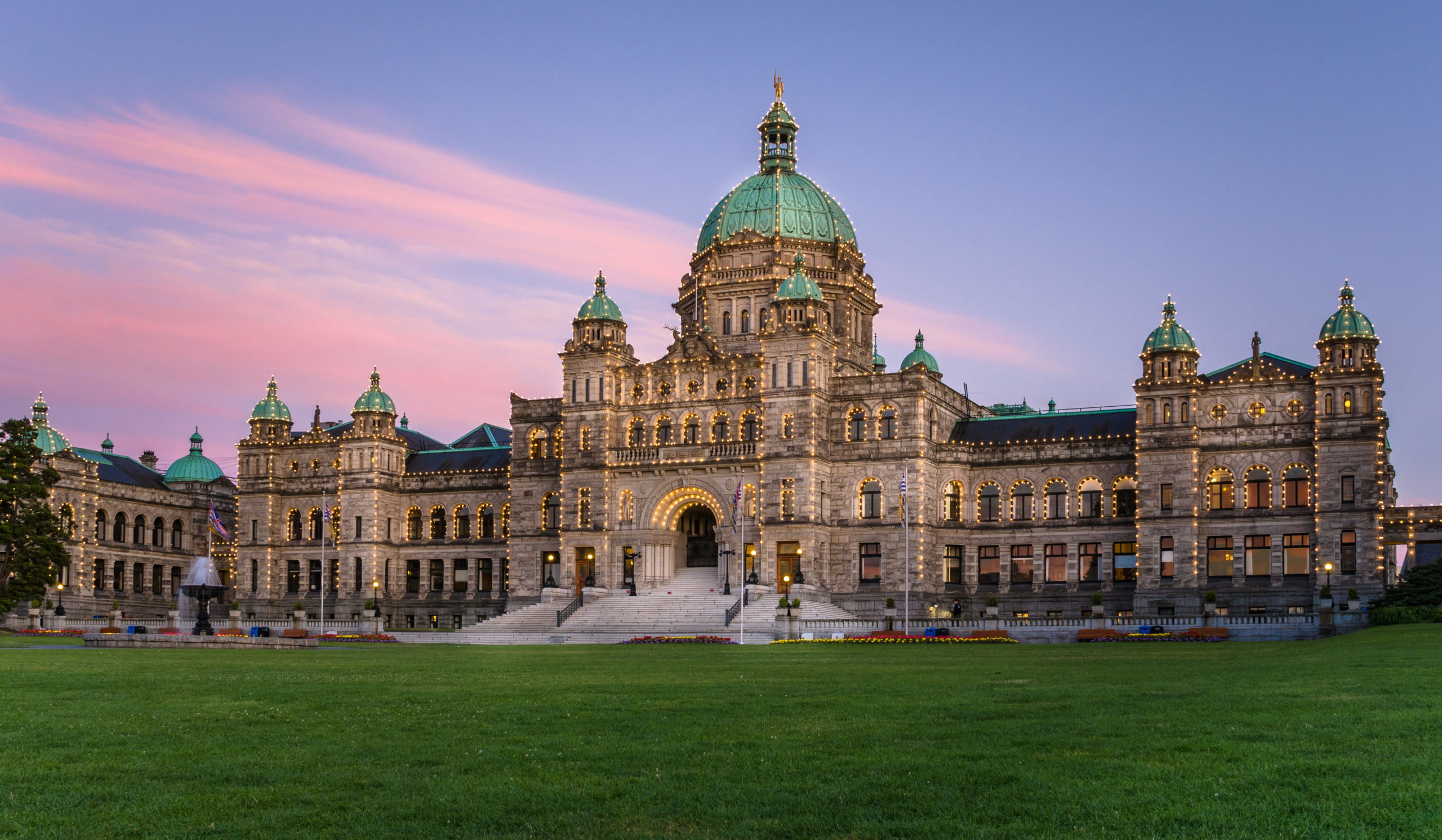 British Columbia Parliament Buildings at sunset in Victoria / Getty Images