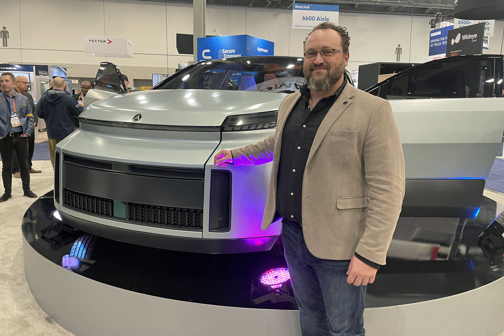 Flavio Volpe, president of the Automotive Parts and Manufacturing Association (APMA), and the Project Arrow all-electric concept / Graeme Fletcher, The Charge