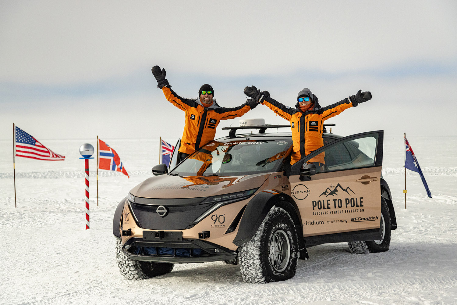 Chris and Julie Ramsey at the South Pole in Antarctica with their Nissan Ariya
